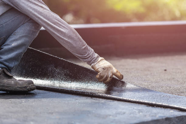 Professional Emergency Waterproofing technician working in Bottineau, ND